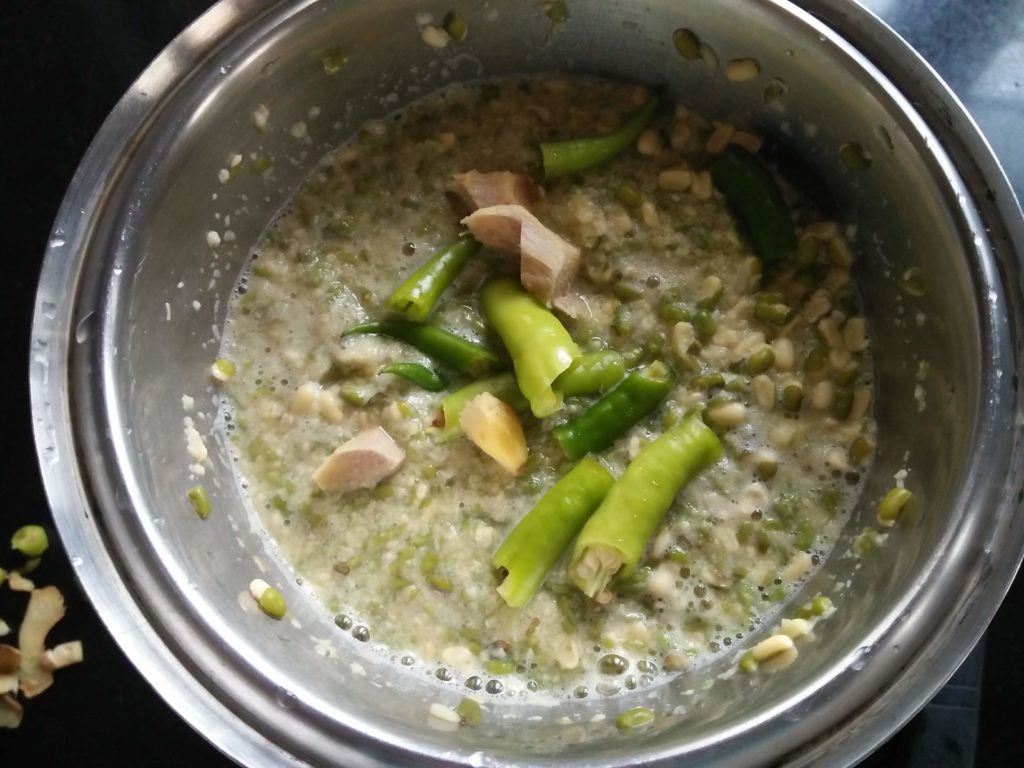 Ingredients green chillies and ginger mixed with split-gren mung dal