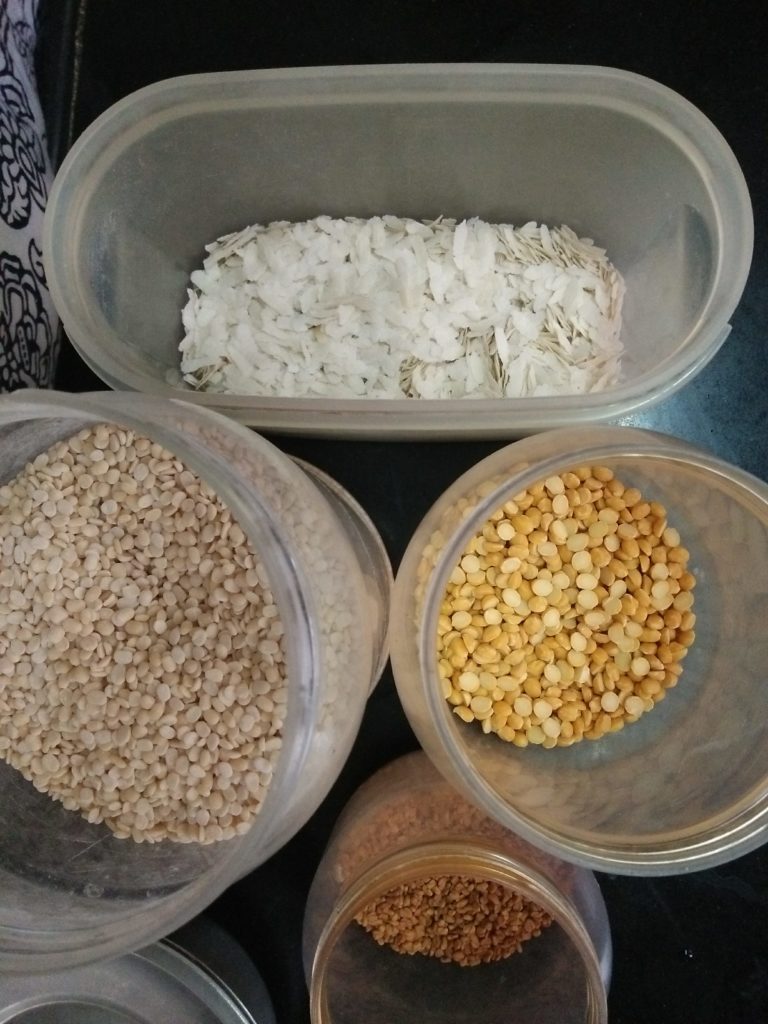 Ingredients used for dosa batter. Chana dal, Urad dal, Methi dana(dry fenugreek), poha(flattened rice)