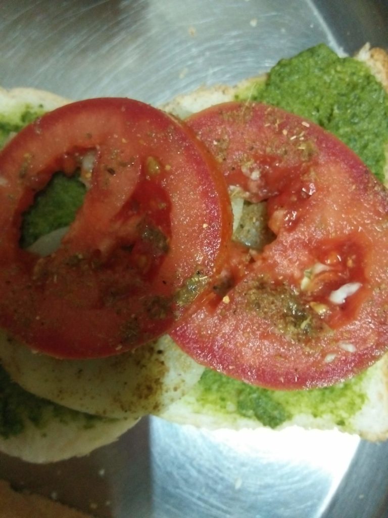 Tomato and Potato slices on one layer of Sandwich