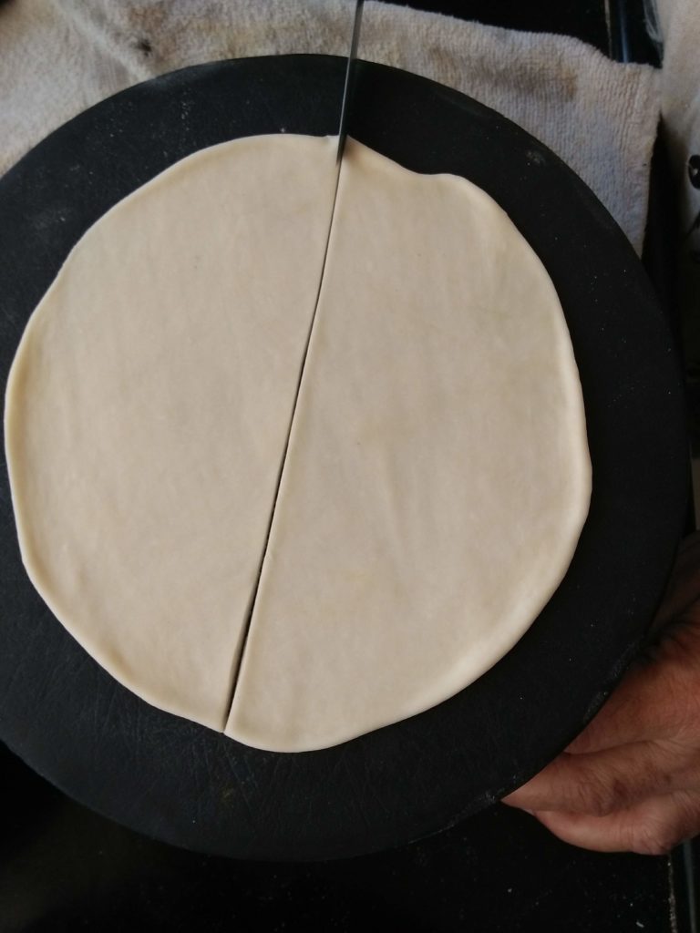 Maida flour Rotis cut into half