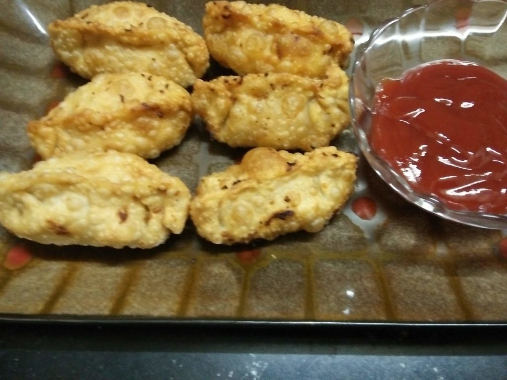 Fried momos served with tomato ketchup-An Indian Fusion Recipe