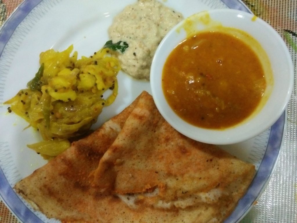 Mysore dossa served with coconut chutney, masala and sambhar