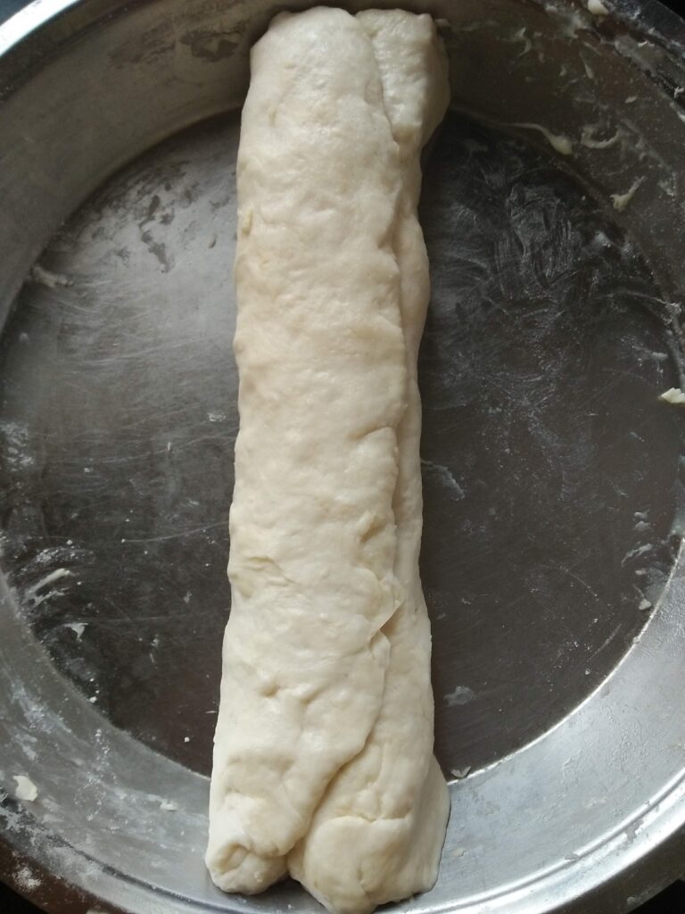 Dough rolled to prepare Amritsari Kulcha, a street food of India