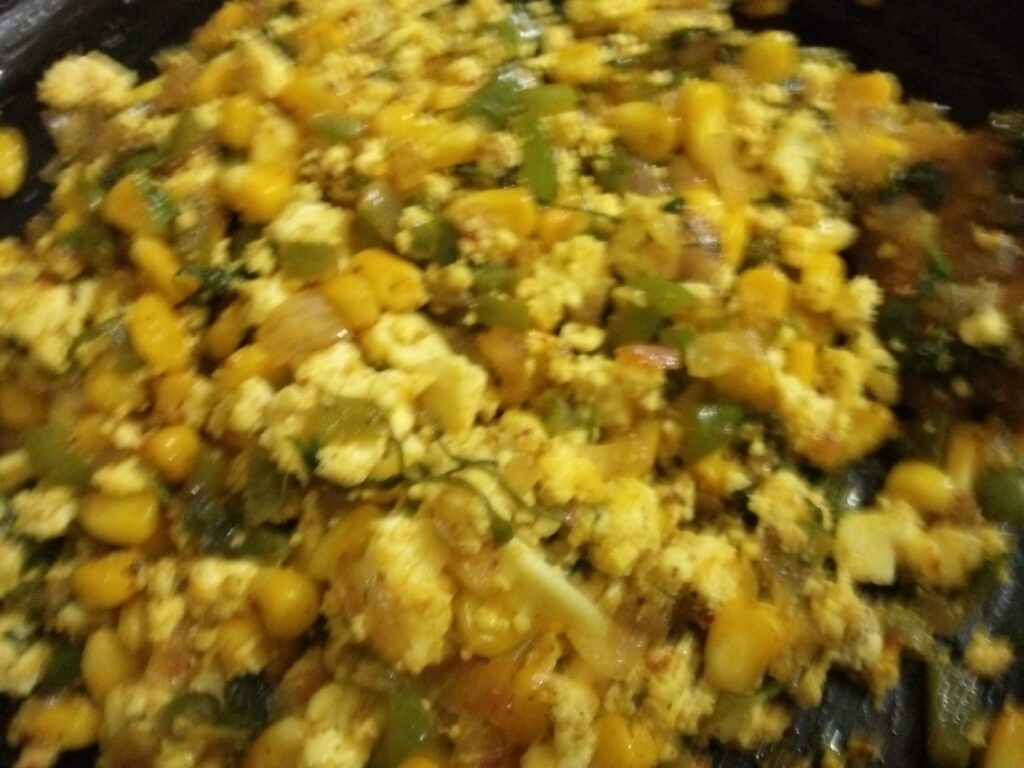 stuffing prepared for corn capsicum paneer paratha